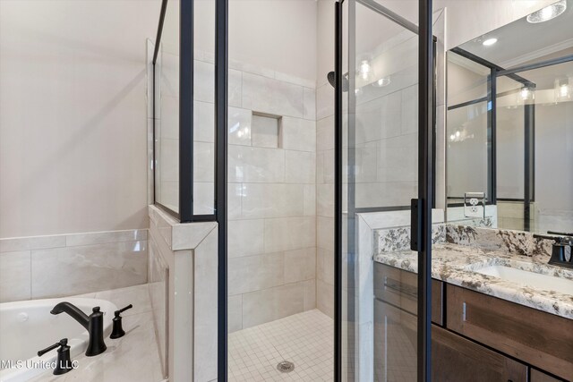 8025 Old Addison Dr, Olive Branch, MS 38654 - full bathroom featuring a shower stall, vanity, and a bath