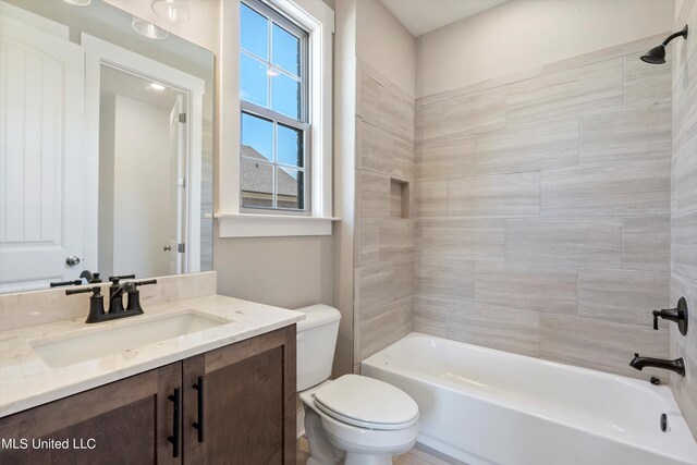 8025 Old Addison Dr, Olive Branch, MS 38654 - bathroom featuring toilet, vanity, and shower / tub combination