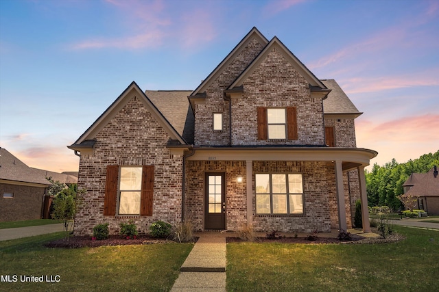 8025 Old Addison Dr, Olive Branch, MS 38654 - view of front of house featuring brick siding and a lawn