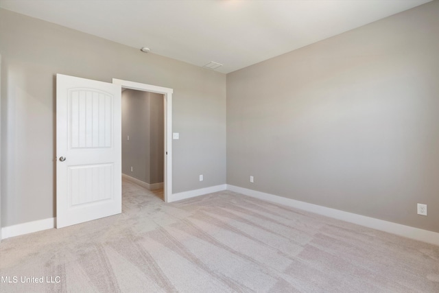 8025 Old Addison Dr, Olive Branch, MS 38654 - spare room featuring light carpet and baseboards