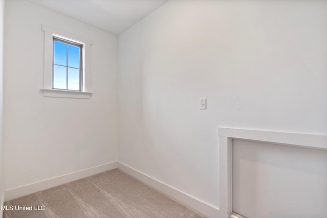 8025 Old Addison Dr, Olive Branch, MS 38654 - unfurnished room with baseboards and light carpet