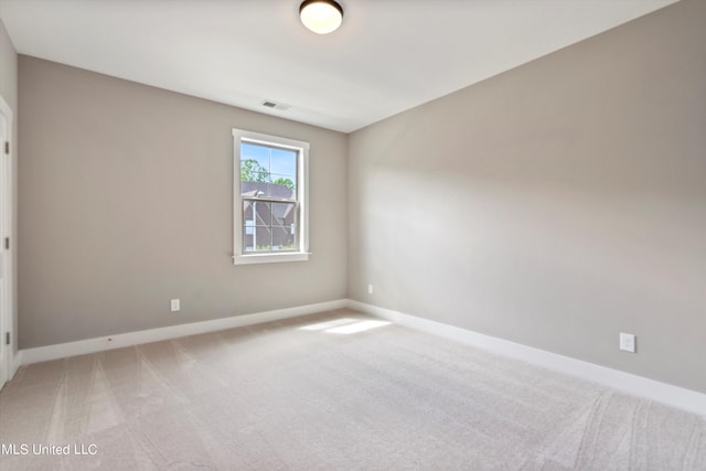 8025 Old Addison Dr, Olive Branch, MS 38654 - unfurnished room featuring light carpet and baseboards