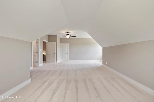 8025 Old Addison Dr, Olive Branch, MS 38654 - additional living space featuring a ceiling fan, light carpet, baseboards, and lofted ceiling