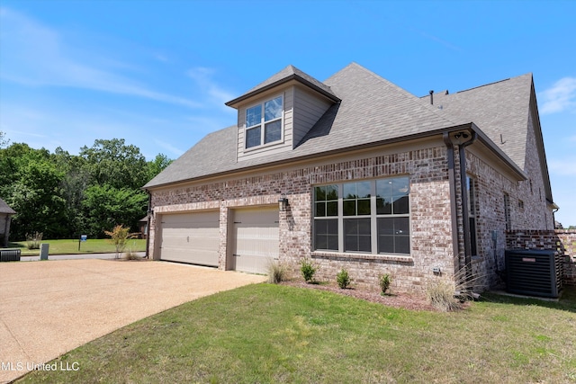 8025 Old Addison Dr, Olive Branch, MS 38654 - view of front of property featuring brick siding, central AC unit, driveway, a front yard, and roof with shingles