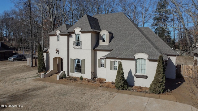 view of french country inspired facade