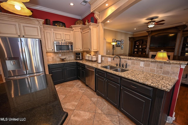 kitchen with tasteful backsplash, sink, light tile patterned floors, stainless steel appliances, and crown molding