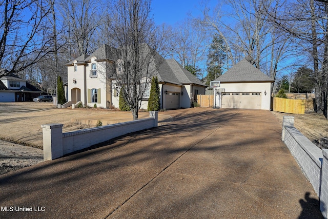 view of front of property with a garage