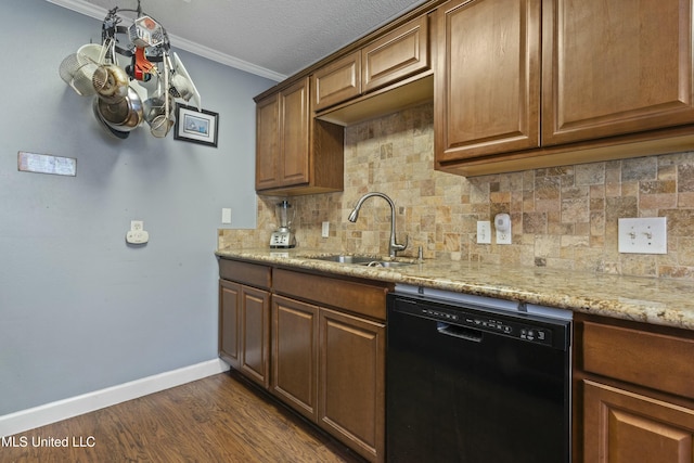 kitchen featuring crown molding, dark wood finished floors, dishwasher, a sink, and backsplash