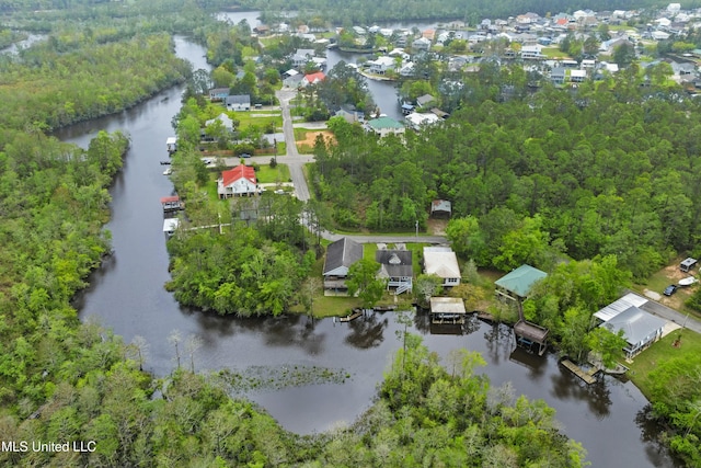 bird's eye view featuring a residential view and a water view