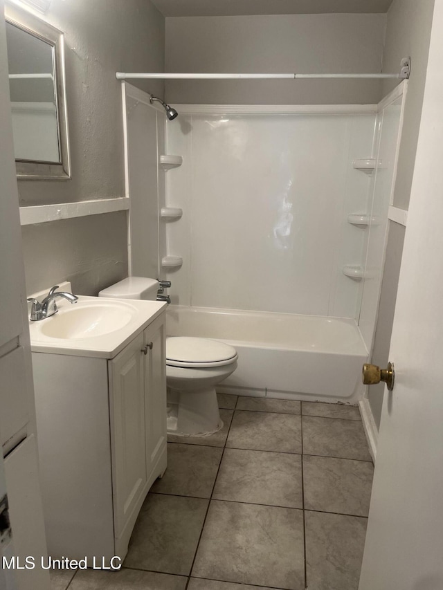 3006 Oak Forest Dr, Jackson, MS 39212 - full bathroom featuring toilet, vanity, shower / bathtub combination, and tile patterned floors
