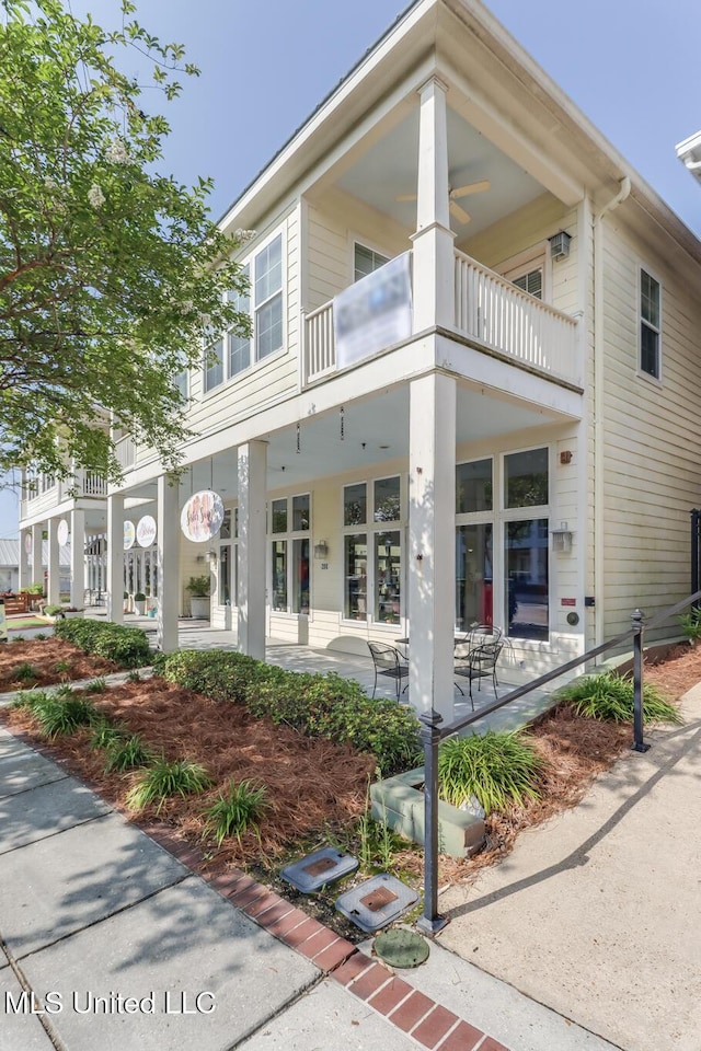 200 Jeff Davis Ave Unit 8, Long Beach, MS 39560 - view of front of house featuring a balcony and a patio