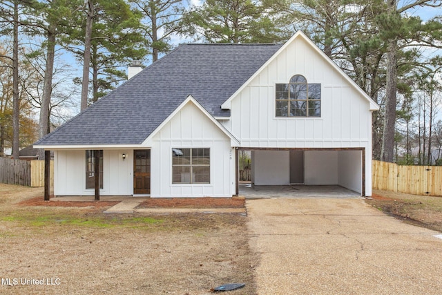 modern farmhouse style home featuring a garage