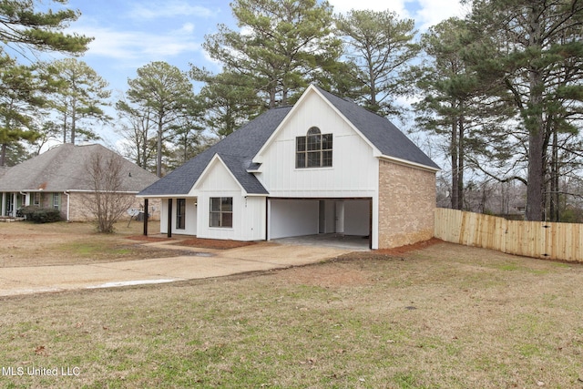 modern farmhouse style home with a garage and a front yard