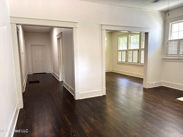 902 Washington St, Natchez, MS 39120 - corridor featuring wood finished floors and baseboards