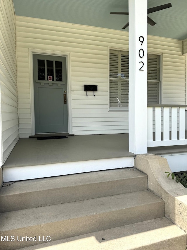 902 Washington St, Natchez, MS 39120 - property entrance featuring a ceiling fan and a porch