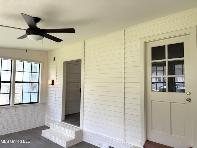 902 Washington St, Natchez, MS 39120 - doorway to property with ceiling fan