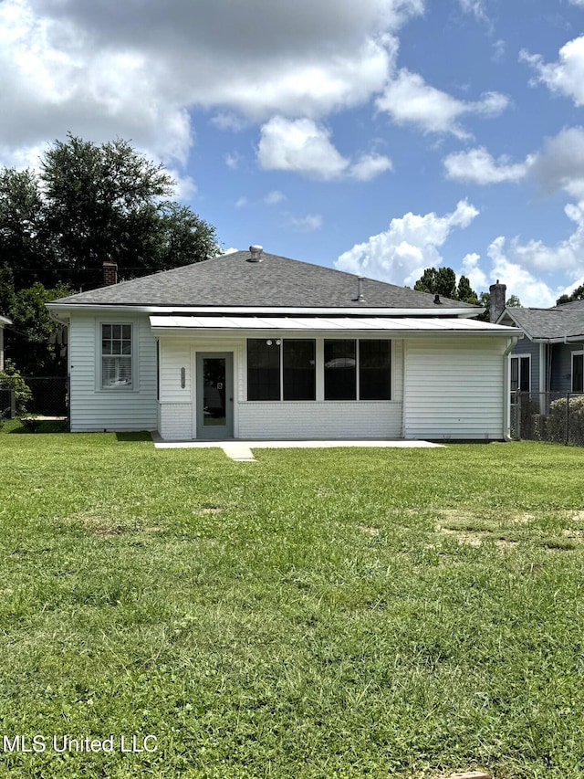 902 Washington St, Natchez, MS 39120 - rear view of property featuring a chimney, brick siding, and a shingled roof