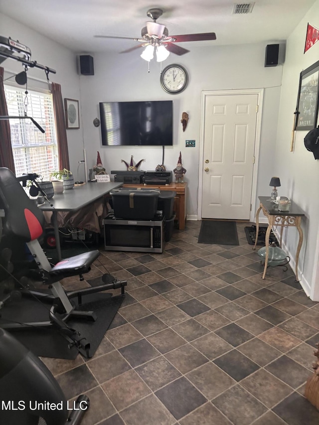 1720 Barracuda Dr, Gautier, MS 39553 - living area with ceiling fan and baseboards