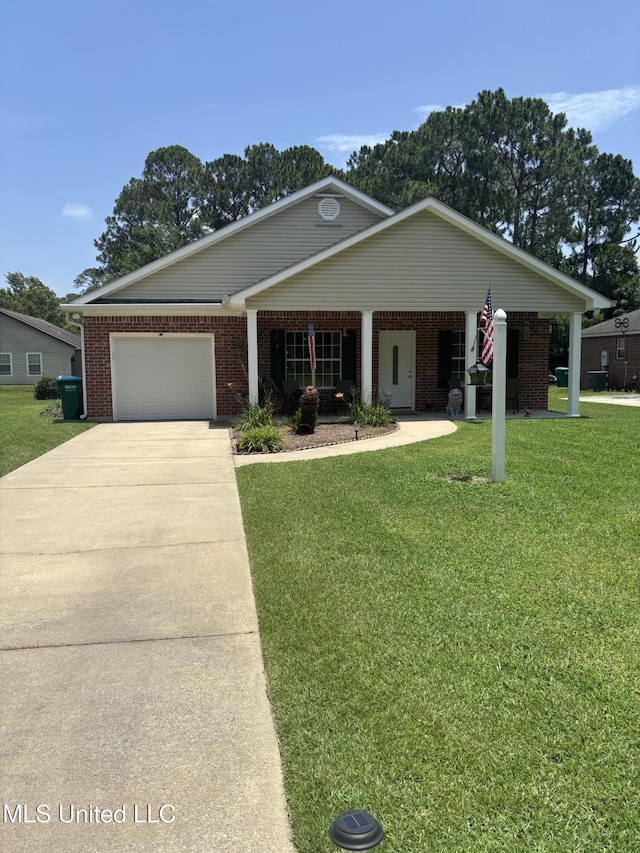 1720 Barracuda Dr, Gautier, MS 39553 - view of front of property featuring driveway, a garage, brick siding, a front lawn, and covered porch