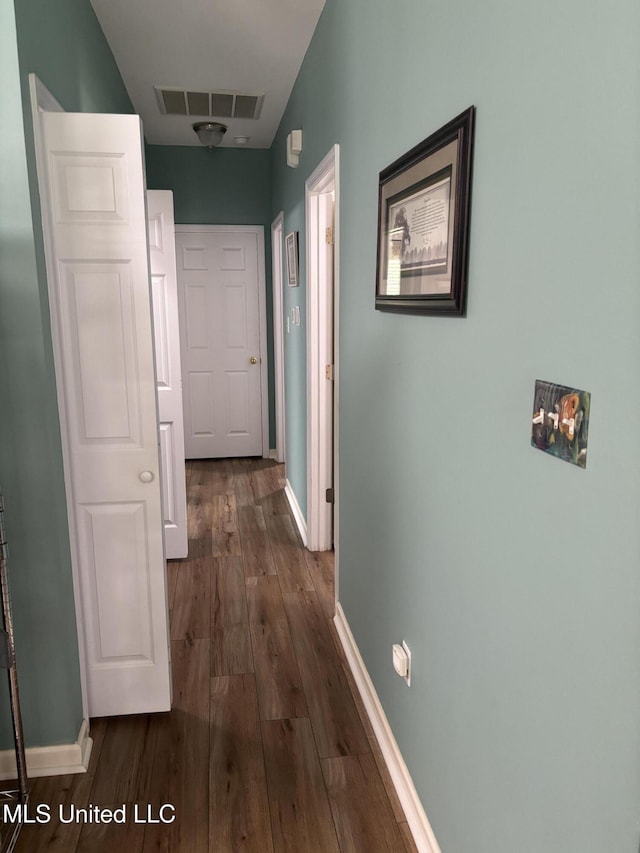 1720 Barracuda Dr, Gautier, MS 39553 - corridor with dark wood-style flooring and baseboards