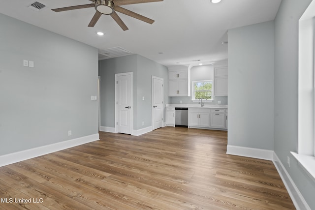 417 4th Ave, Pass Christian, MS 39571 - unfurnished living room with a ceiling fan, light wood-style floors, and recessed lighting