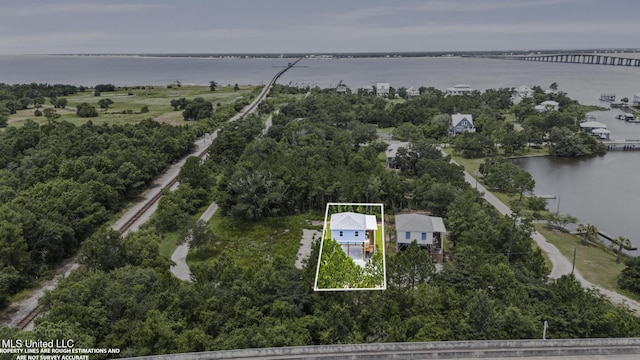 417 4th Ave, Pass Christian, MS 39571 - aerial view of property's location with a nearby body of water, a notable bridge, and property parcel outlined