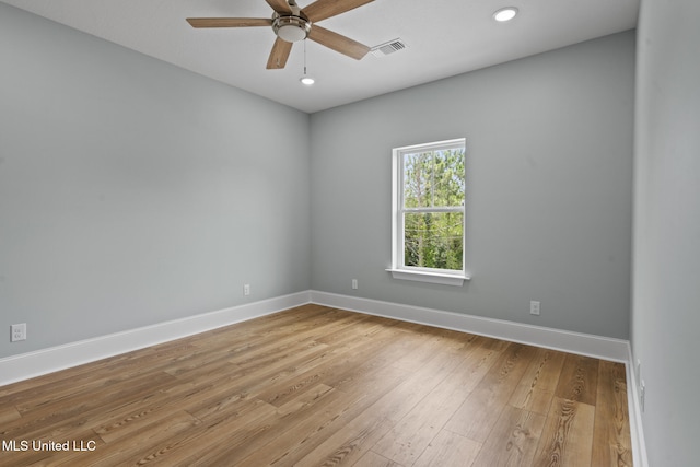 417 4th Ave, Pass Christian, MS 39571 - spare room with a ceiling fan, light wood finished floors, and recessed lighting