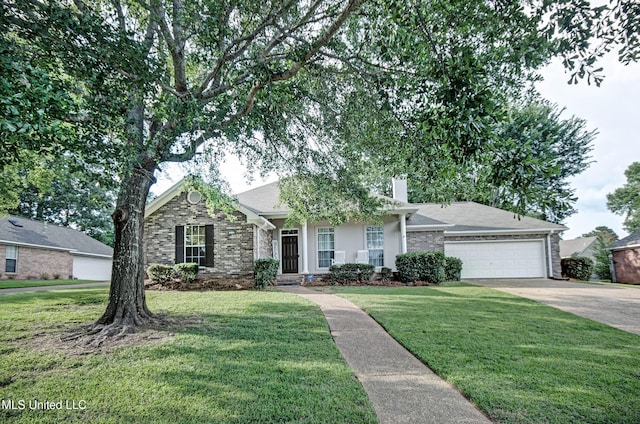 215 Moss Valley Dr, Brandon, MS 39042 - view of front facade with a front yard, driveway, an attached garage, a chimney, and brick siding