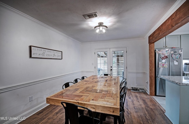 215 Moss Valley Dr, Brandon, MS 39042 - dining room with ornamental molding, dark wood-style flooring, a textured ceiling, and french doors