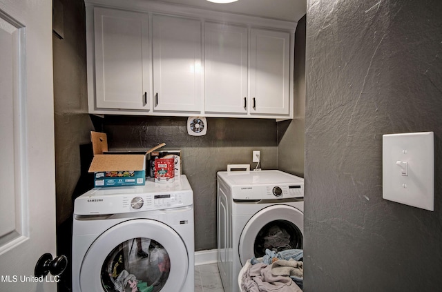 215 Moss Valley Dr, Brandon, MS 39042 - laundry room with independent washer and dryer and cabinet space