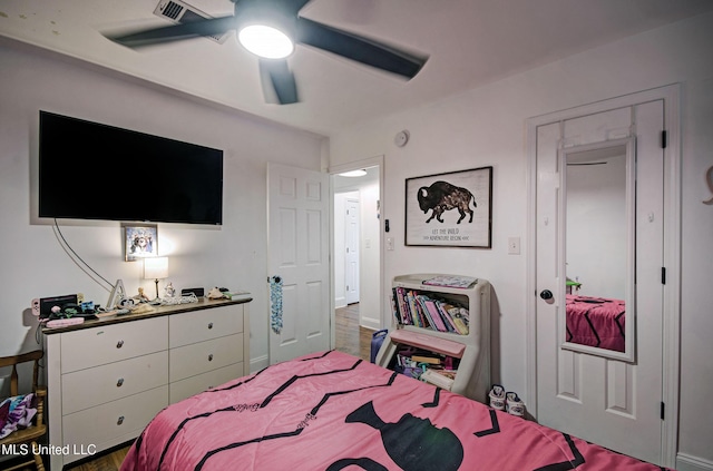 215 Moss Valley Dr, Brandon, MS 39042 - bedroom featuring wood finished floors and a ceiling fan