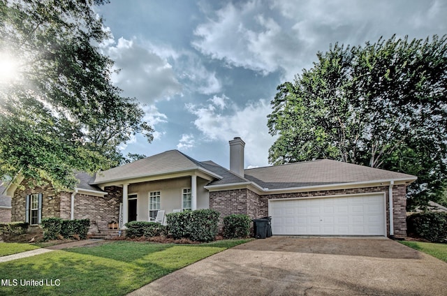 215 Moss Valley Dr, Brandon, MS 39042 - view of front of home with a garage, driveway, a front yard, and brick siding