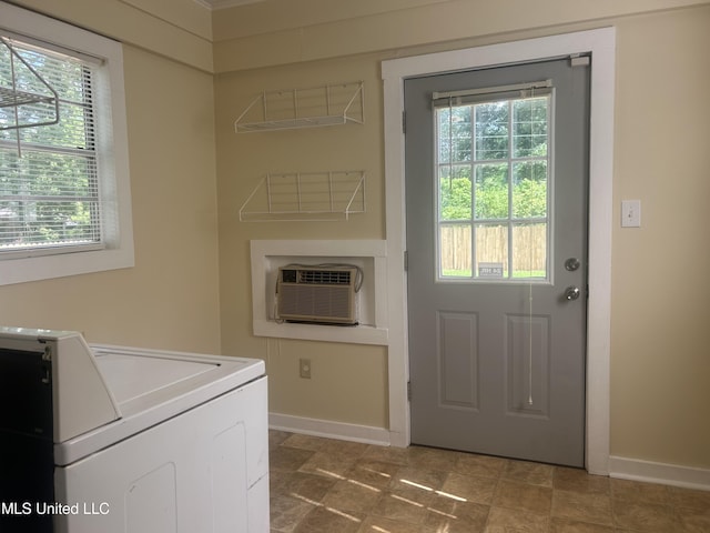 501 W Jefferson Ave, Greenwood, MS 38930 - laundry room featuring baseboards and a healthy amount of sunlight