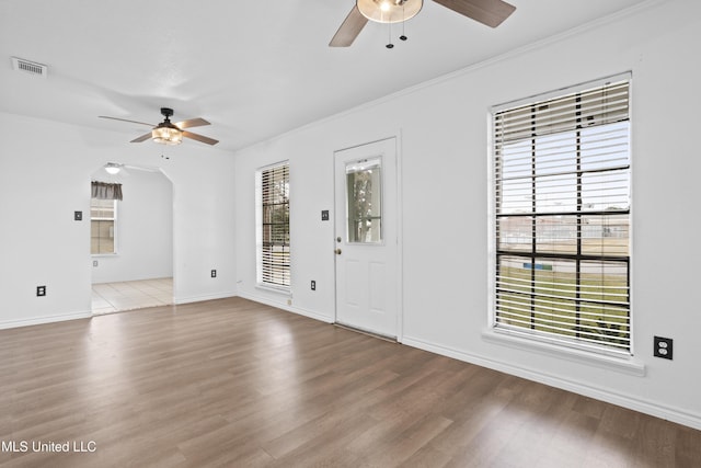 interior space featuring a healthy amount of sunlight and light hardwood / wood-style flooring