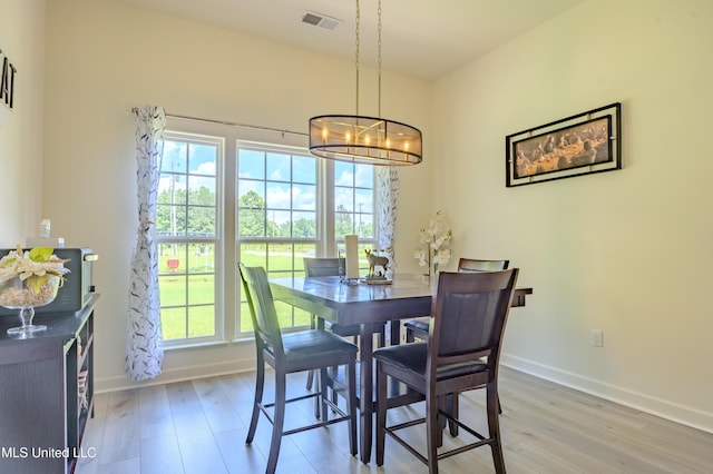75 Dry Field Cv, Byhalia, MS 38611 - dining room with light wood-type flooring and a chandelier