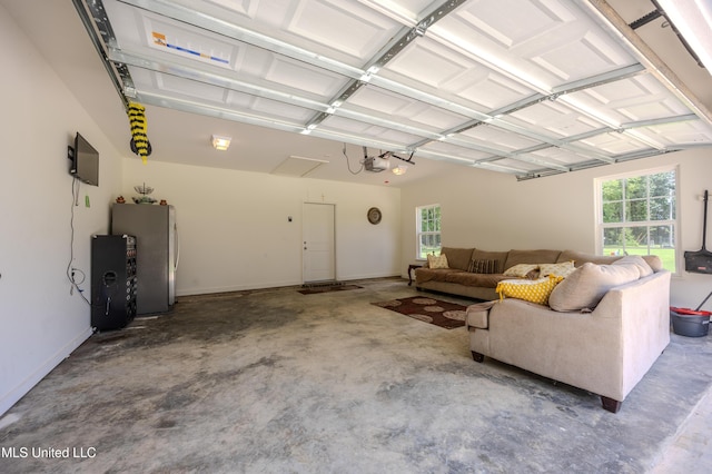 75 Dry Field Cv, Byhalia, MS 38611 - garage featuring refrigerator and a garage door opener