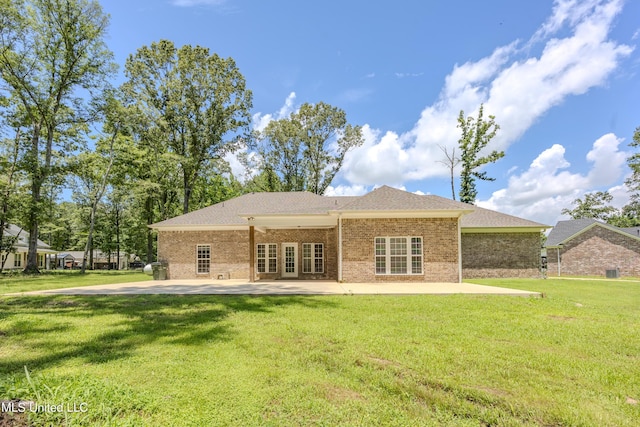 75 Dry Field Cv, Byhalia, MS 38611 - rear view of property featuring brick siding, a yard, french doors, and a patio area