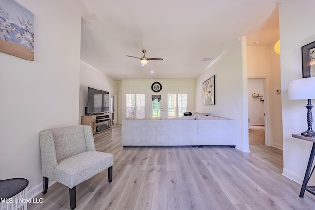 75 Dry Field Cv, Byhalia, MS 38611 - living area with a ceiling fan, light wood-style floors, and ornamental molding