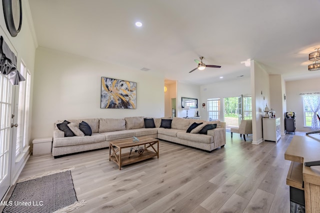 75 Dry Field Cv, Byhalia, MS 38611 - living area featuring healthy amount of natural light, light wood finished floors, a ceiling fan, recessed lighting, and crown molding
