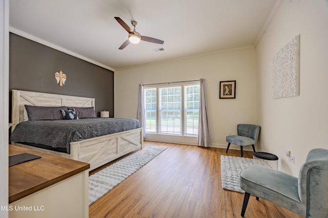 75 Dry Field Cv, Byhalia, MS 38611 - bedroom with crown molding, light wood finished floors, and a ceiling fan