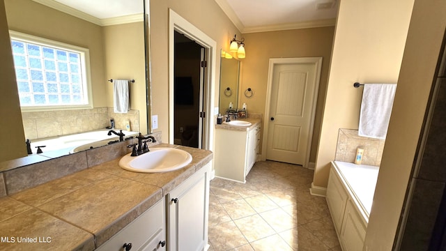 bathroom featuring vanity, crown molding, tile patterned floors, and a bathing tub