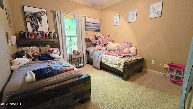 bedroom with crown molding and carpet