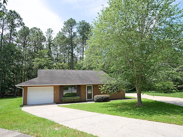 view of front of house featuring concrete driveway, a front yard, an attached garage, and roof with shingles
