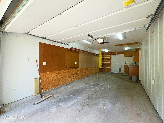 garage featuring a garage door opener