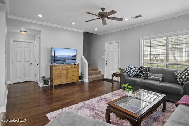 living area featuring stairway, wood finished floors, visible vents, recessed lighting, and crown molding