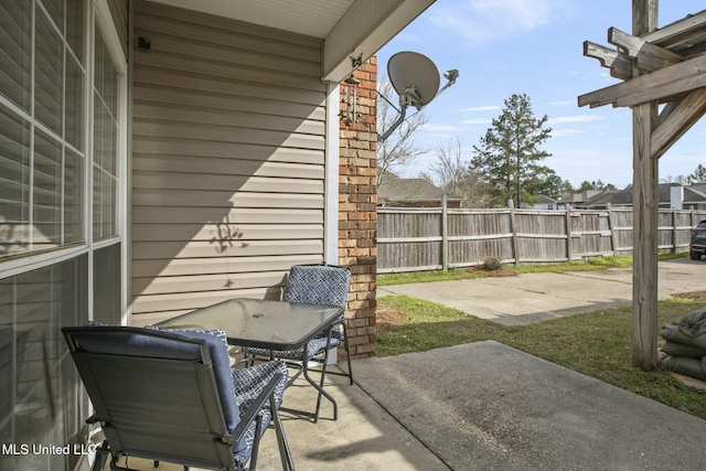 view of patio / terrace with fence