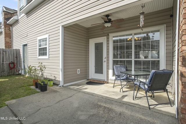 view of patio / terrace featuring a ceiling fan and fence