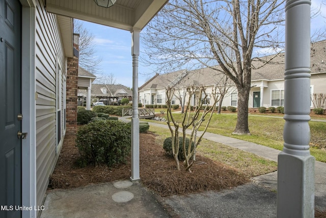 view of yard featuring a residential view