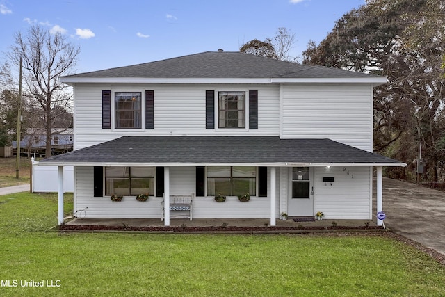 view of front of house featuring a porch and a front yard