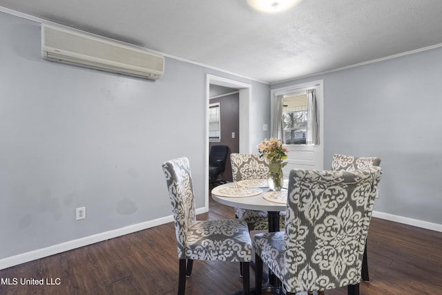 dining area featuring crown molding, dark hardwood / wood-style floors, a wall mounted air conditioner, and a textured ceiling